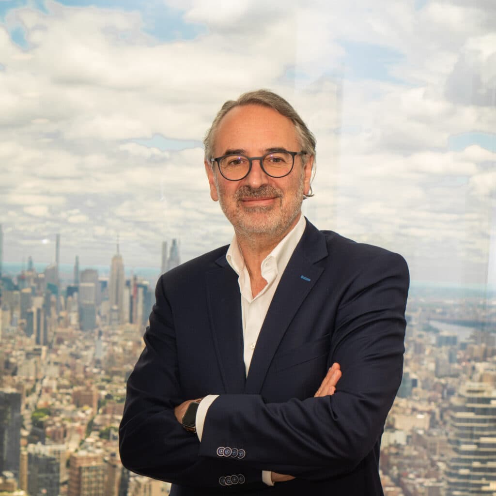 Michael Ruhl in front of the New York City skyline